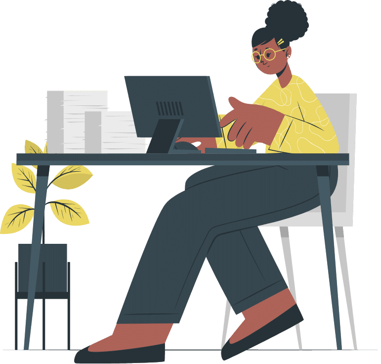 business woman sitting at desk working on computer